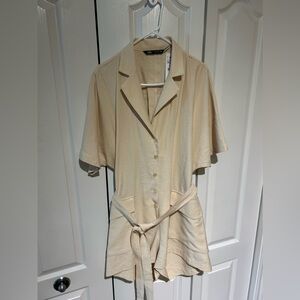 Brand new never worn with tags CUTE. Zara back out romper